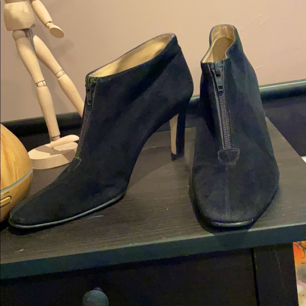 Black high-heeled leather booties